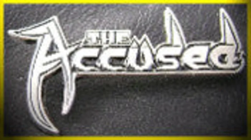 ACCUSED METAL BADGE