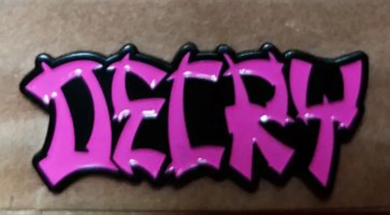 DECRY ENAMEL BADGE