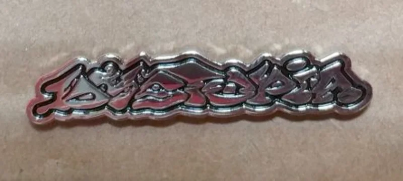 DYSTOPIA ENAMEL BADGE