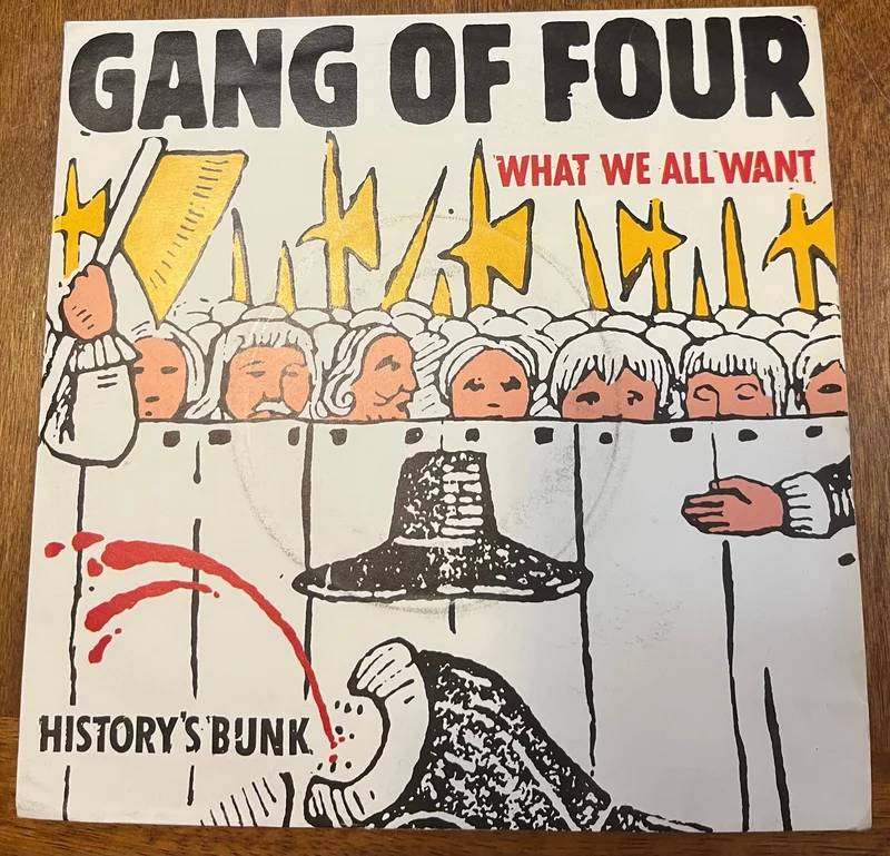 Gang Of Four - What We All Want b/w History's Bunk  w/PS
