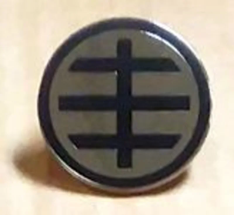 HUSKER DU ENAMEL BADGE